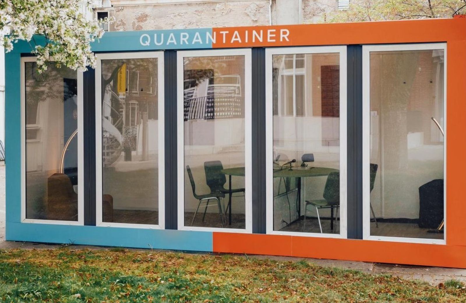 The Quarantainer, a mobile meeting room with glass walls